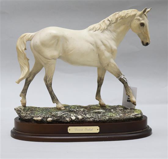 A Royal Doulton model of Desert Orchid, on stand